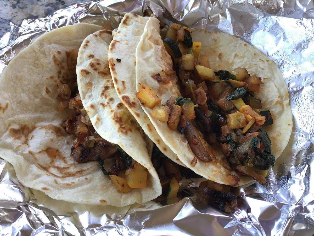 Mexico Mi Amor offers flour or corn tacos in asada, pastor, pollo, grilled shrimp, birria, carnitas, chorizo and vegetarian (above) flavors.