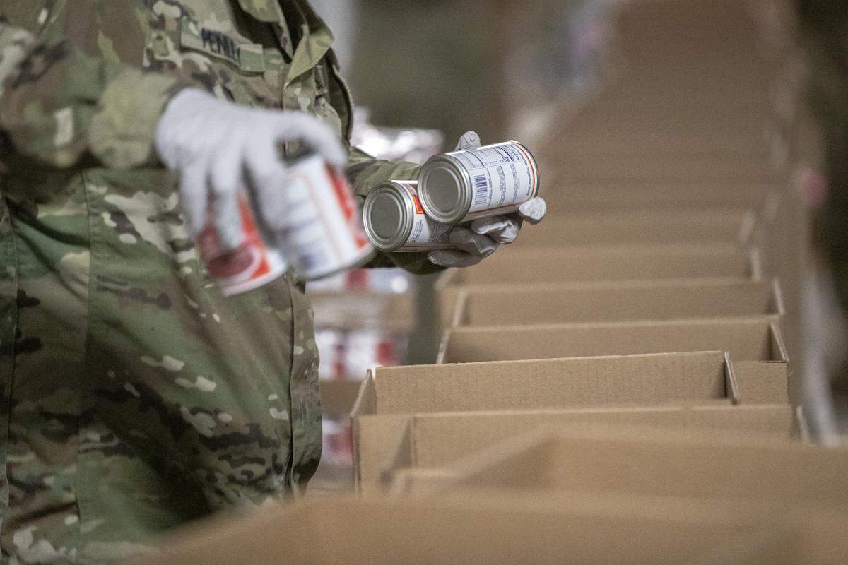 God’s Pantry CEO Michael Halligan said he expects the 20 members of the Kentucky National Guard to pack 10,000 boxes of food during the next two weeks. The guardsmen and women’s work with God’s Pantry helped prepare products to ship for the 400 food programs that God’s Pantry supports in Central and Eastern Kentucky.