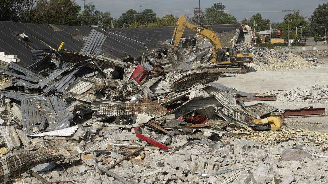 A demolition crew worked on the former Circuit City and Rafferty's on Nicholasville Road in Lexington. New tenants, including a two-story Planet Fitness, are planned for the space.  