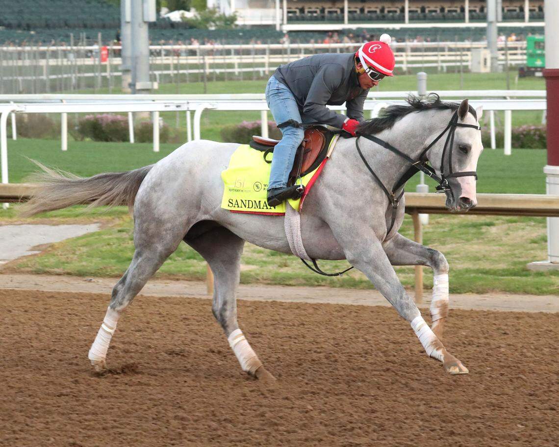 Kentucky Derby hopeful Sandman gallops at Churchill Downs on Sunday.