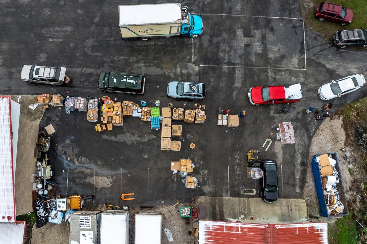 Food and other household items are distributed at the Hazel Green Food Project in Hazel Green, Ky., on Friday, Nov. 22, 2024.