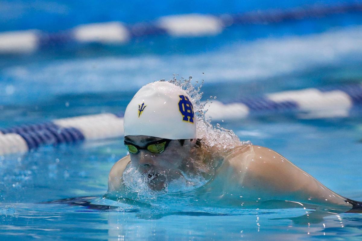 Jackson Millard swims in the 500-yard freestyle during the boys’ state championship at the UK Lancaster Aquatic Center on Friday. “I’m just glad I got to beat out all those St. X boys,” he said.