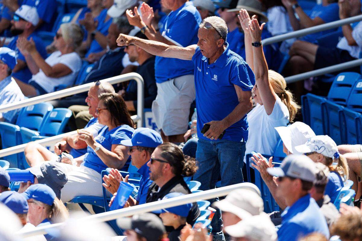May 31, 2024; Lexington, KY, USA; Kentucky fans celebrate a strike out during the ninth inning of an NCAA Division I Baseball Championship game between the Kentucky Wildcats and Western Michigan Broncos at Kentucky Proud Park. Mandatory Credit: Jordan Prather-USA TODAY Sports