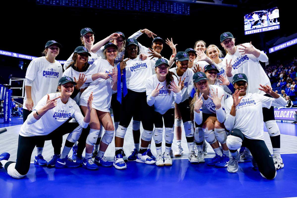 The Kentucky volleyball team celebrates winning the outright SEC championship on Saturday afternoon at Rupp Arena. The Wildcats have won four outright SEC championships in the last seven years.