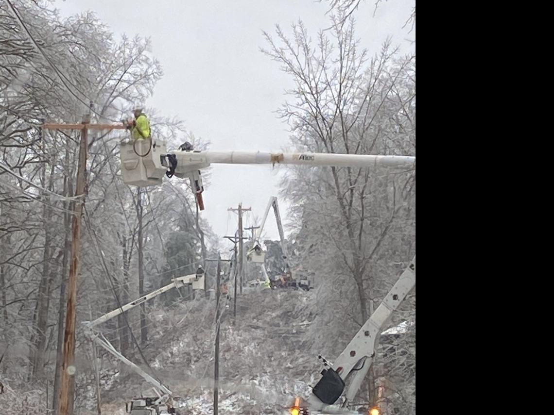 Kentucky Power crews worked on Feb. 15 to restore electricity in northeastern Kentucky after ice knocked out power to thousands of homes and businesses.