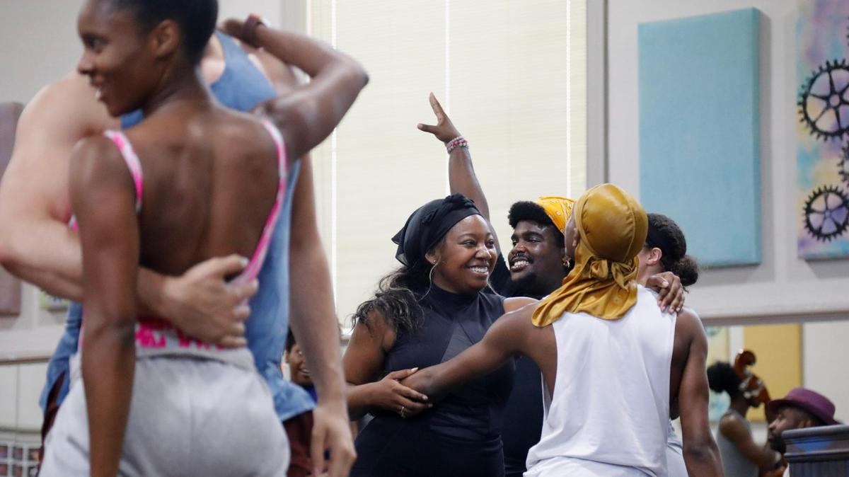 Mya Bryant, center, smiles after a musical number on Wednesday, July 26, 2023 at Artworks at the Carver School in Lexington, Ky.