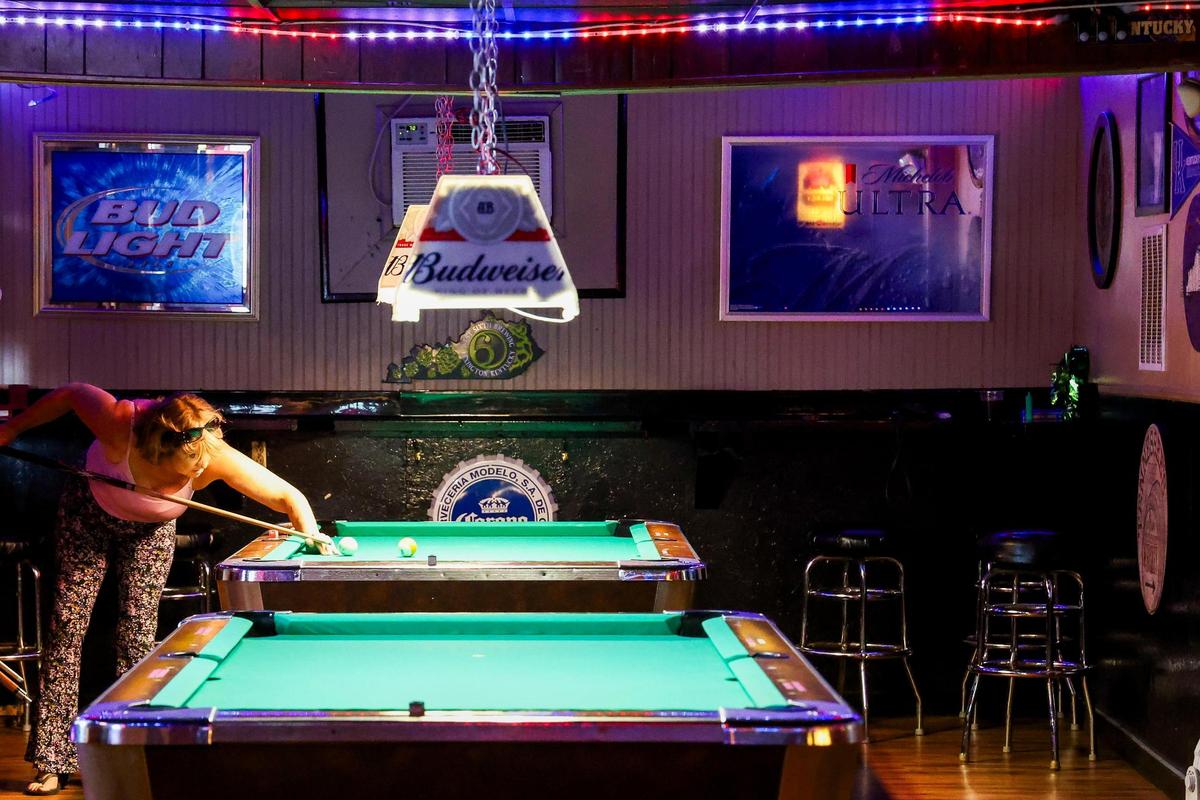 Rose & Jim’s Bar And Grill, photographed April 2, 2025 in Lexington, Ky., has pool tables, corn hole and more, what owner Jimalou Bayes calls “an adult playground.”