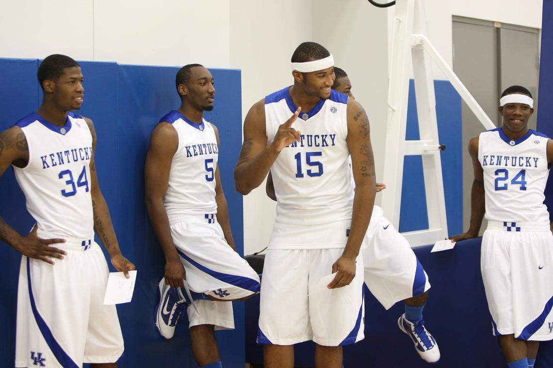 DeMarcus Cousins, center, joked while having his photo made during a University of Kentucky men's basketball photo day held in the Joe Craft Center on Sept. 2, 2009. In the background are, from left, DeAndre Liggins, Ramon Harris and Eric Bledsoe.