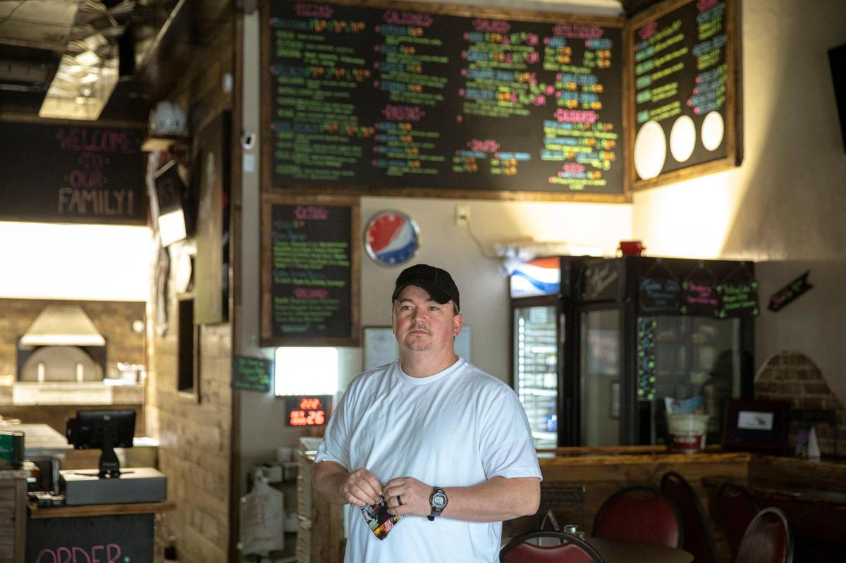 Jeff Brown, owner of The Brick Oven in Williamsburg, Ky., poses for a portrait at his restaurant on Monday, Oct. 26, 2020.