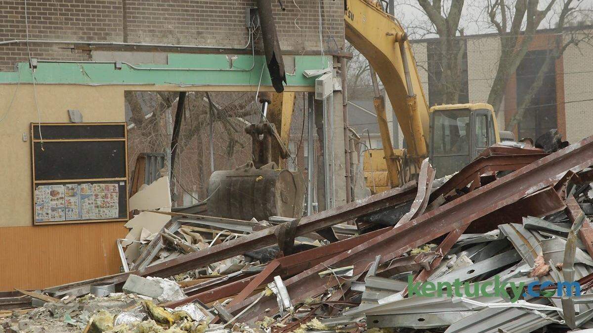 A demolition crew tore down the Kroger grocery store on Euclid in Lexington, Ky., on April 7, 2014.  The neighborhood grocery store is being replaced by a larger, modern Kroger expected to open later this year. Photo by Pablo Alcala | Staff
