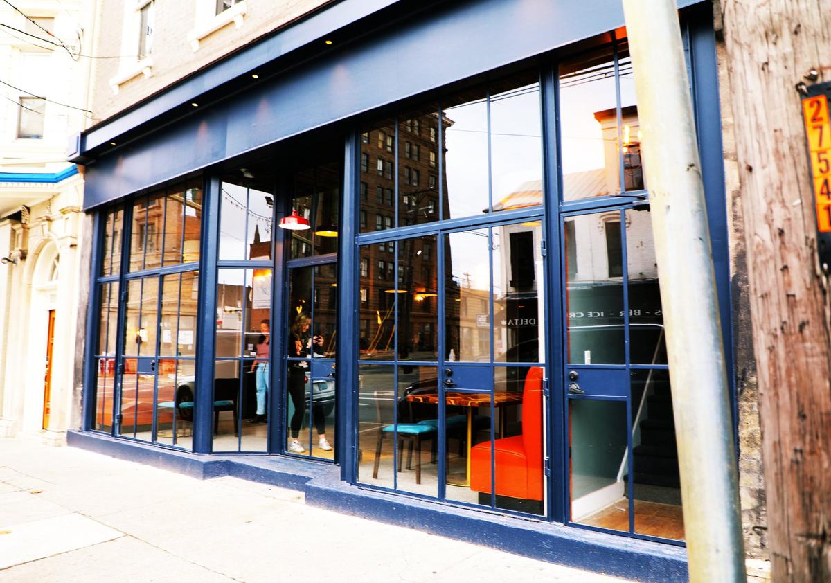 Industrial floor-to-ceiling windows create an open concept feel at the new Lexington restaurant bar 3Ten on November 29, 2024, in downtown Lexington, Ky.