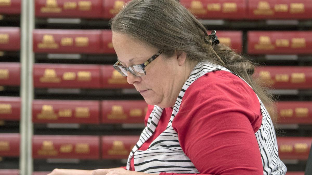 Kim Davis, the county clerk for Rowan County in Kentucky, works with the county election board on Election Day, Tuesday, Nov. 6, 2018, in Morehead, Ky. Davis, who went to jail in 2015 for refusing to issue marriage licenses to same-sex couples, has lost her bid for a second term as county clerk.