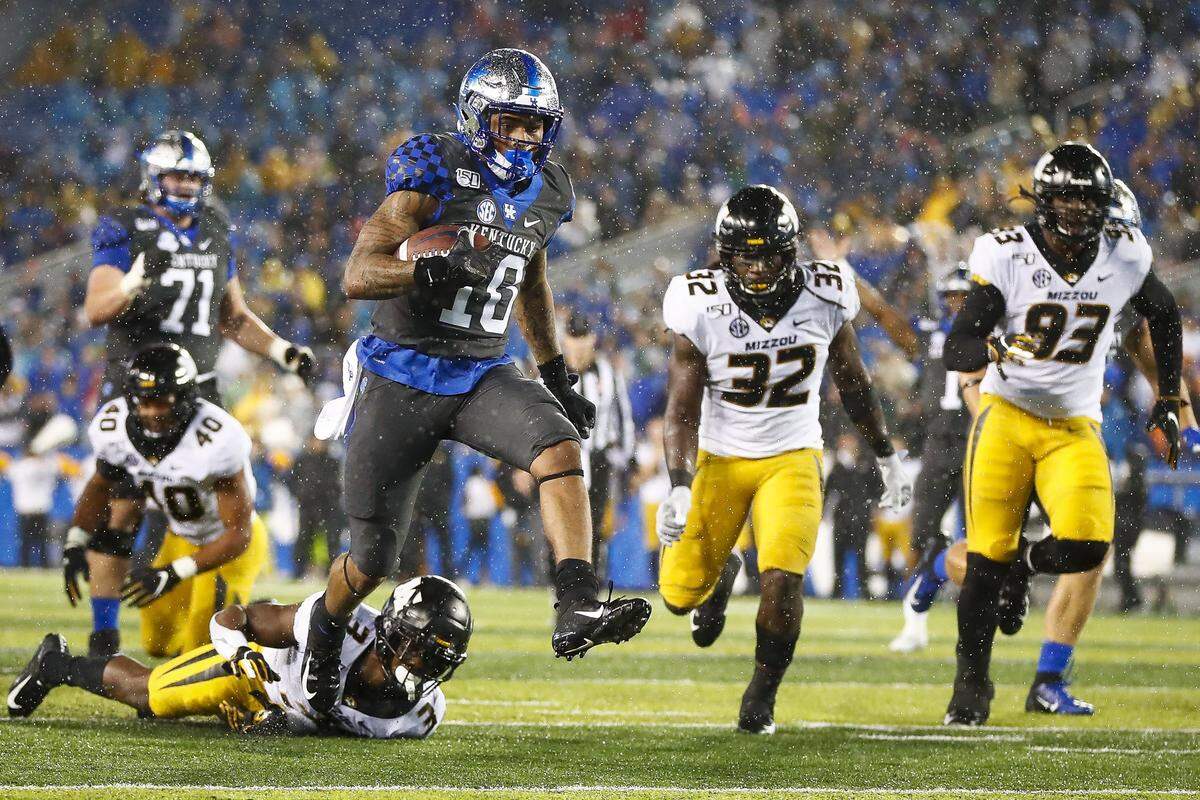 Kentucky running back A.J. Rose (10) ran for a touchdown against Missouri last October, one of six he scored on the year.