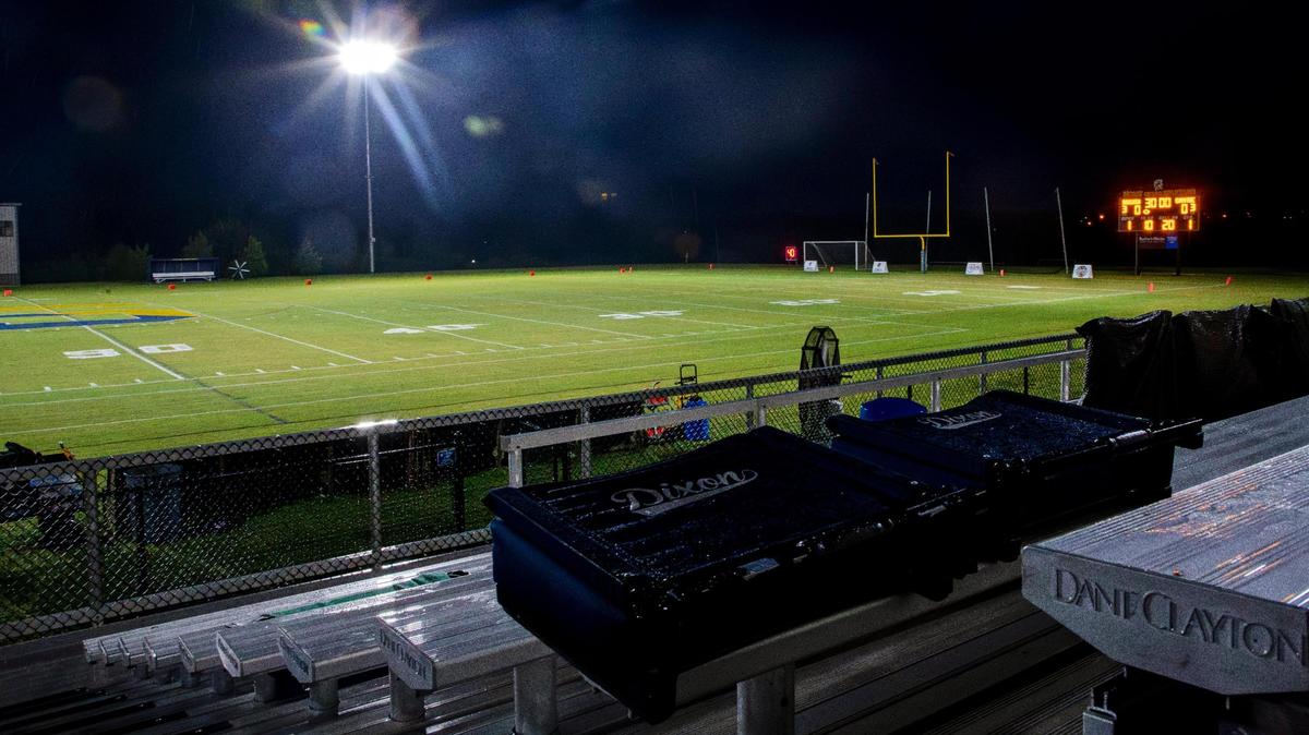 The football field and stands sit empty Friday at Sayre during a storm delay. The Spartans’ game against Bracken County was postponed until 8 p.m. Saturday.