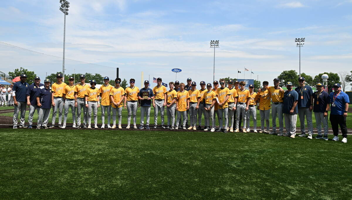 Sayre’s players and coaches pose with their Baseball State Tournament presented by UK HealthCare quarterfinalist trophy after their 6-1 loss to McCracken County at Legends Field on Saturday. Photos available for purchase via Danny Vaughn Photography.