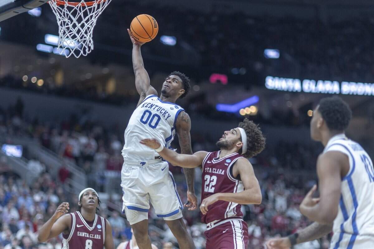 Kentucky guard Otega Oweh (00) had 35 points, eight rebounds and seven assists in UK’s 89-84 overtime win over Santa Clara in the 2026 NCAA men’s basketball tournament round of 64. UK and Louisville represented the commonwealth of Kentucky in 2026 men’s March Madness.