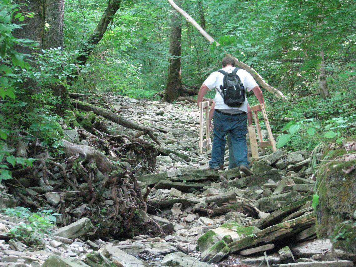 The dig was in a remote spot in  southern Woodford County;  workers walked up a dry creekbed to get there.  