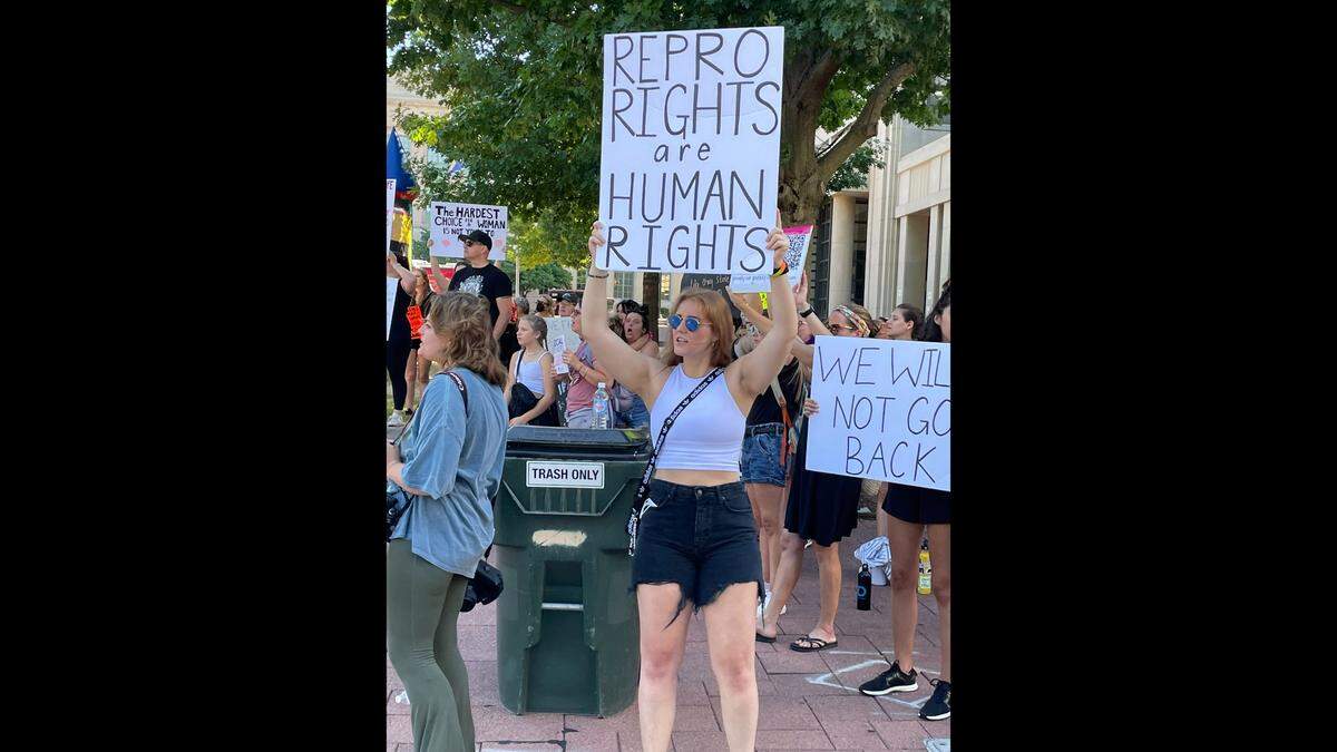 Protesters held signs and led chants outside of the Fayette County Courthouse on July 4, 2022, to protest the reversal of Roe vs. Wade by the U.S. Supreme Court.