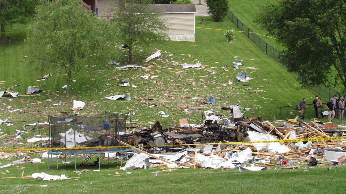 Authorities investigated an explosion that destroyed a garage in a subdivision in Pulaski County, Kentucky on May 5, 2024.