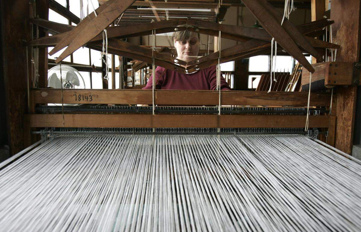Joyce Kain, an employee of 16 years, worked the loom at Churchill Weavers in February 2007 just before the Berea factory closed.