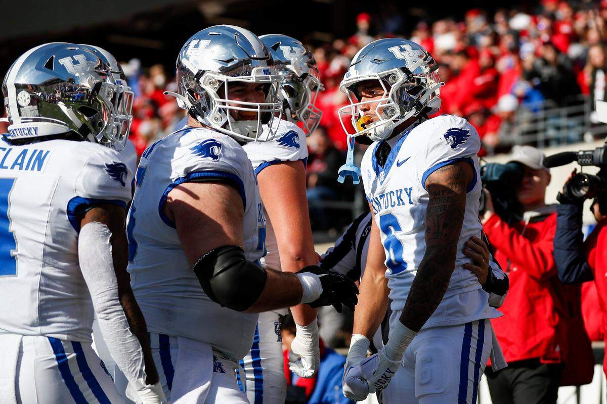 Kentucky wide receiver Dane Key (6) celebrates a catch for a touchdown against Louisville during Saturday’s game at L&N Federal Credit Union Stadium.