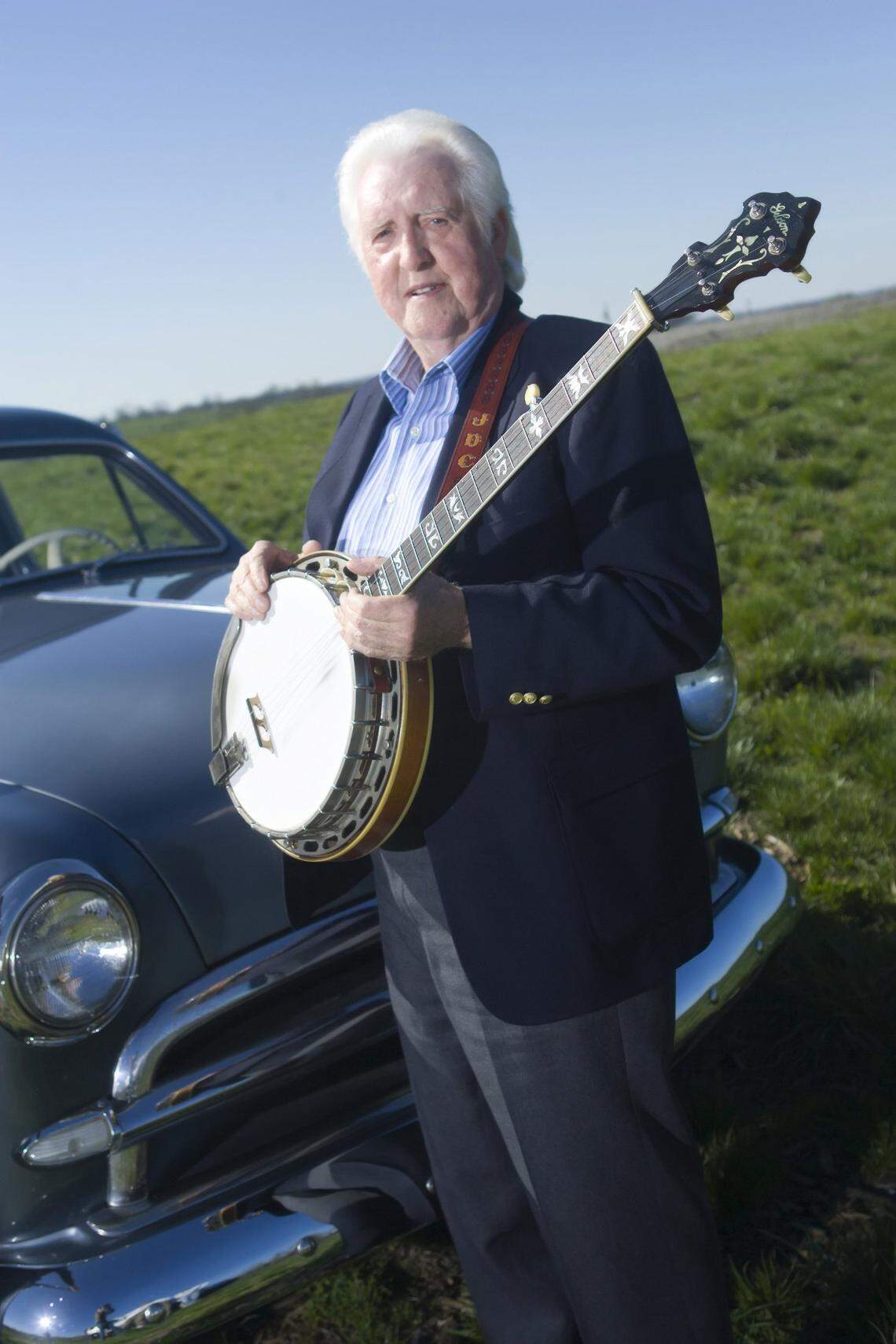 April 9, 2006- Bluegrass musician J.D. Crowe stands in a field outside Wilmore, Ky on a Sunday afternoon.