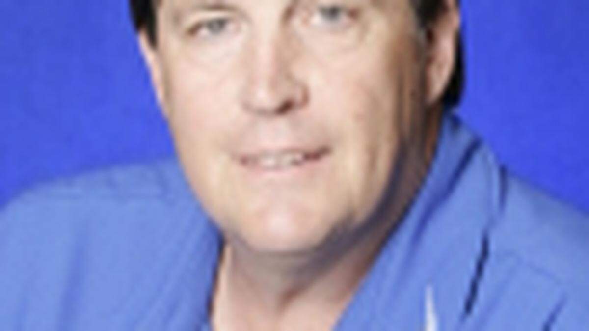 Retired University of Kentucky swimming and diving head coach Gary Conelly