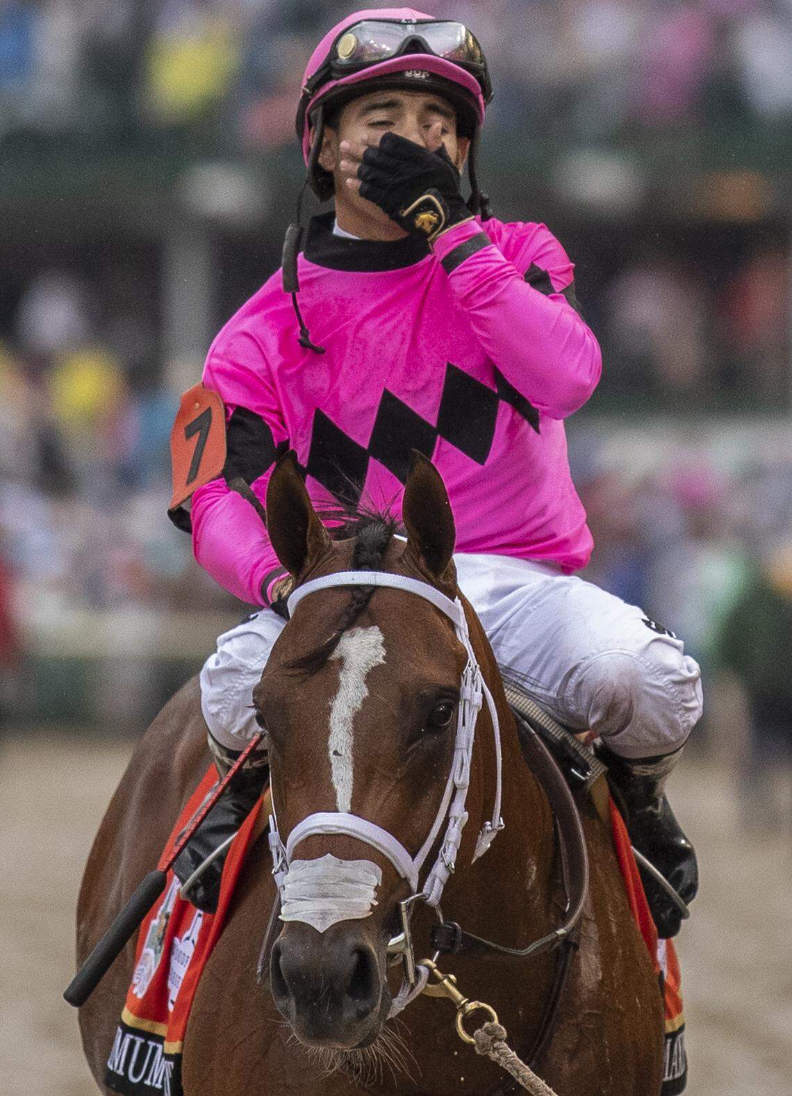 Maximum Security, with Luis Saez up, returns to the finish line of the Kentucky Derby following the race on Saturday, May 4, 2019.