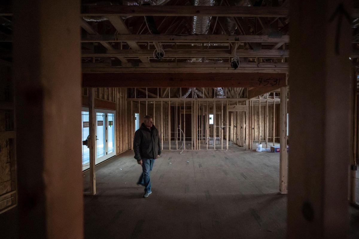 Dwight Harlan stands inside his home that is under construction near Millport, Ky., on Thursday, Feb. 2, 2023. A tornado on Dec. 10, 2021, destroyed Harlan’s previous home on the site.