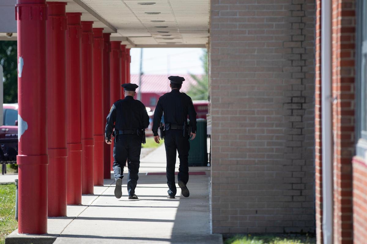 Law enforcement, friends and family gather at Scott County High School for the funeral service of Scott County Deputy Caleb Conley in Georgetown, Ky., Thursday, June 1, 2023. Conley was killed in a shooting on I-75 in May.
