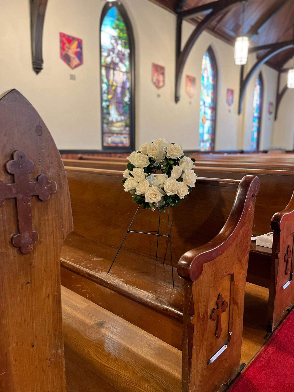 A wreath was placed on the pew where Queen Elizabeth II sat while attending St John’s Episcopal Church in Versailles.