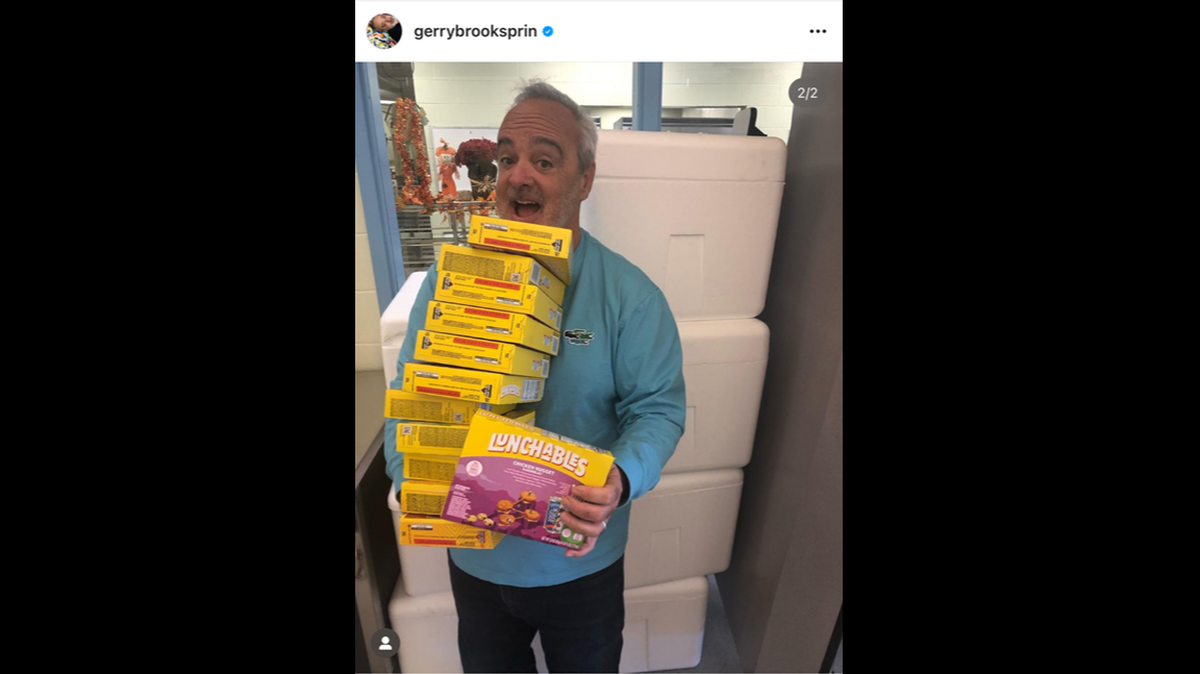 Gerry Brooks with the Lunchables meals sent to Liberty Elementary School in Lexington after he joked about Lunchables in viral videos.