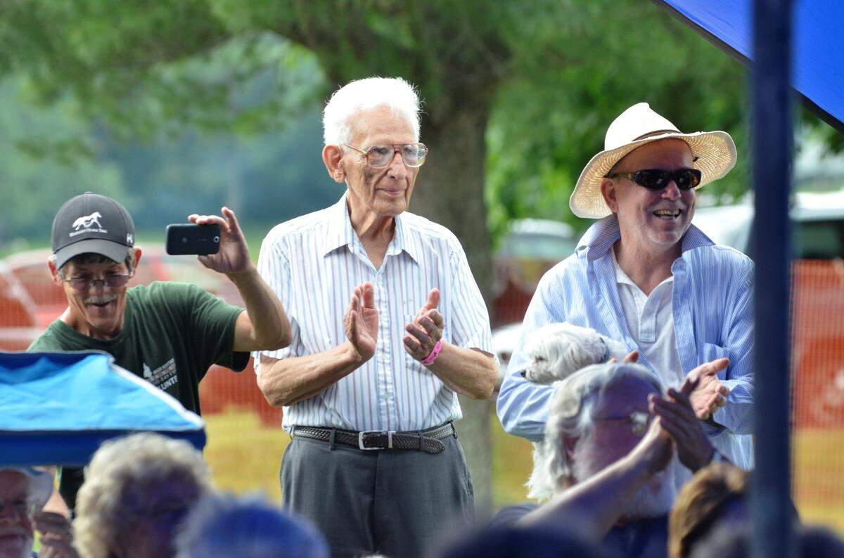 Festival of the Bluegrass co-founder Bob Cornett applauded a performance by Kentucky Blue at the Festival of the Bluegrass in 2013.