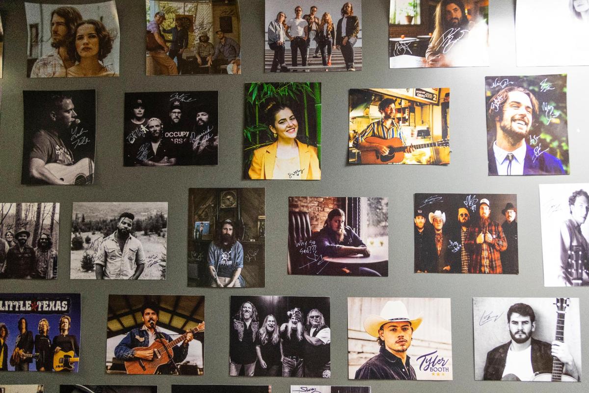 A wall with signed portraits from artists who played at the Alley on Main hang on by the green rooms. Since opening in early August 2021 the Alley on Main has hosted some of Appalachia’s top musical talent including Nicholas Jamerson, Abby Hamilton, John R. Miller, Sierra Ferrell, 49 Winchester and the Kentucky Headhunters, and others.