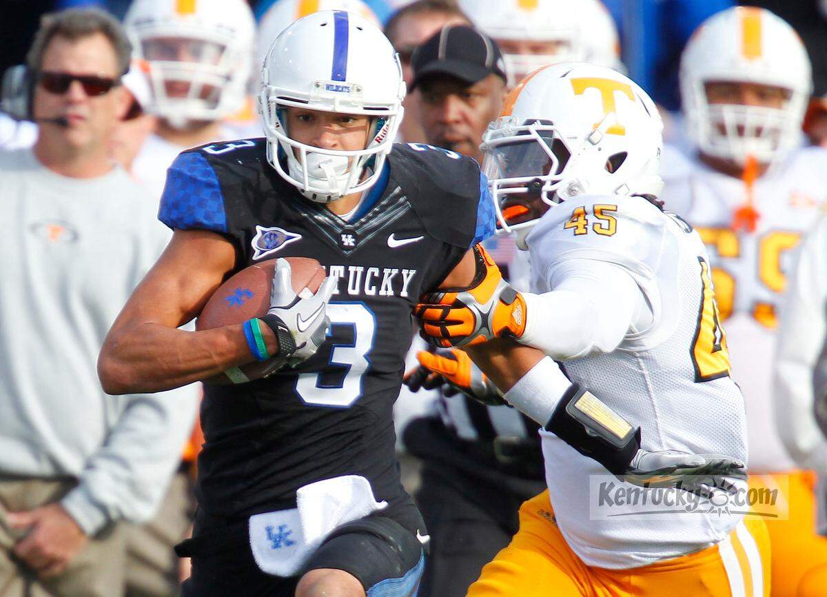Kentucky wide receiver-turned-quarterback Matt Roark (3) ran for 124 yards and directed the Wildcats to a streak-busting 10-7 win over Tennessee in the 2011 season finale.
