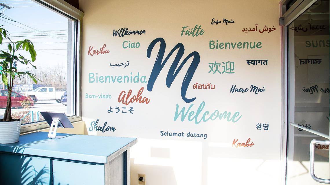 Greeter front entryway for reservations and seating at Minton’s new 701 National Ave location.