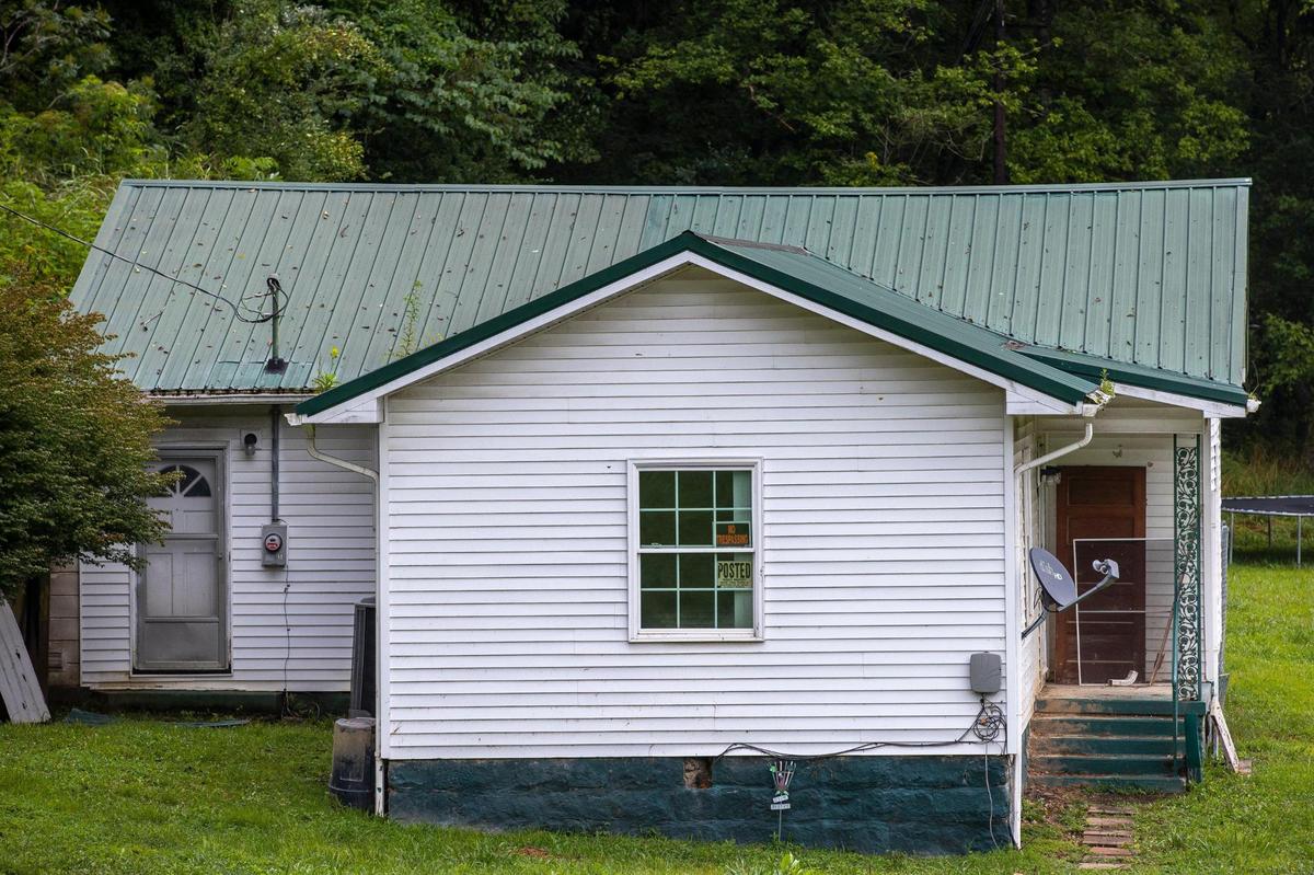 With the water gone, the lower third of the home is now visible.