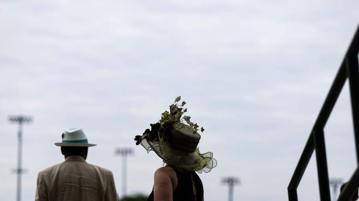 Fans gather in the stands and cheer on undercard races on Derby Day before the 149th running of the Kentucky Derby at Churchill Downs in Louisville, Ky., Saturday, May 6, 2023.