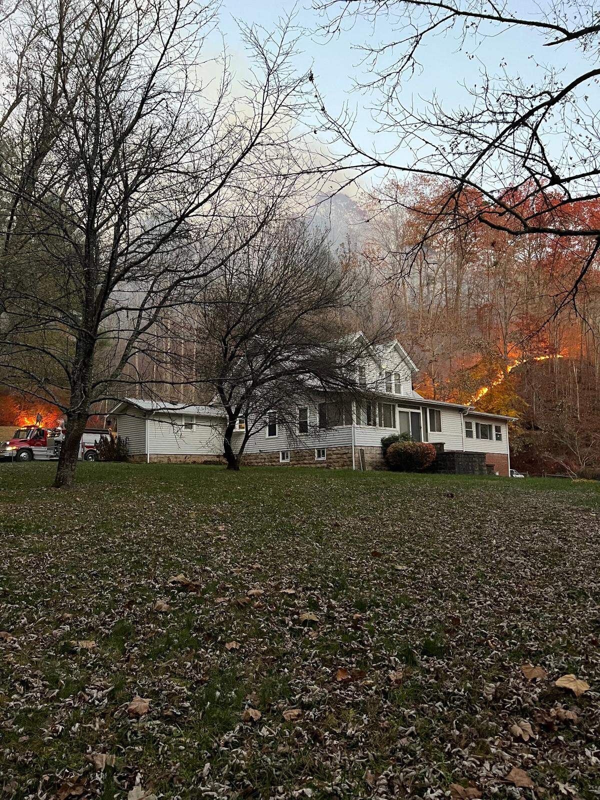 Crews with the Sunshine Fire Department have protected homes and buildings from encroaching wildfire this week.