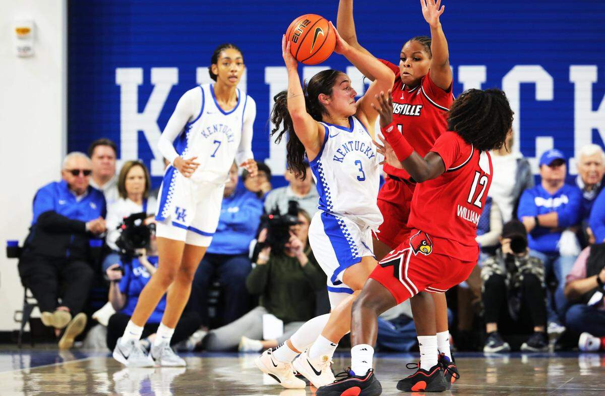 Louisville hit Georgia Amoore with repeated double teams Saturday night. The Kentucky point guard committed eight turnovers but “no matter how rattled we got her, you never saw it on her face,” Louisville coach Jeff Walz said. Amoore led Kentucky with 19 points and nine assists.