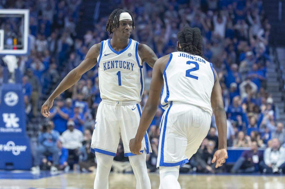 Kentucky guard Denzel Aberdeen (1) congratulates guard Jasper Johnson (2) during the Wildcats’ exhibition win against Purdue at Rupp Arena on Oct. 24.  