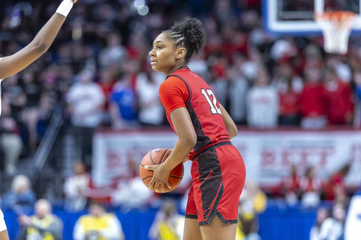 George Roger Clark's Teigh Yeast (12) looks to move the ball in a game against Assumption during the KHSAA girls' basketball championship at Rupp Arena in Lexington, Ky., on Saturday, March 14, 2026. 
