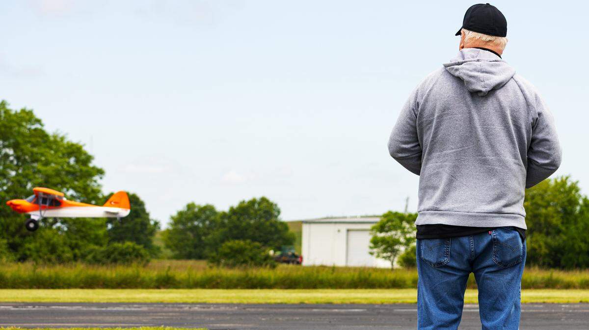 A member of the Lexington Model Airplane Club (LMAC) lands their scale model single-engine plane on the LMAC Flying Facility runway, during the group's final fun fly event on May 9, 2026, in Lexington, Ky.