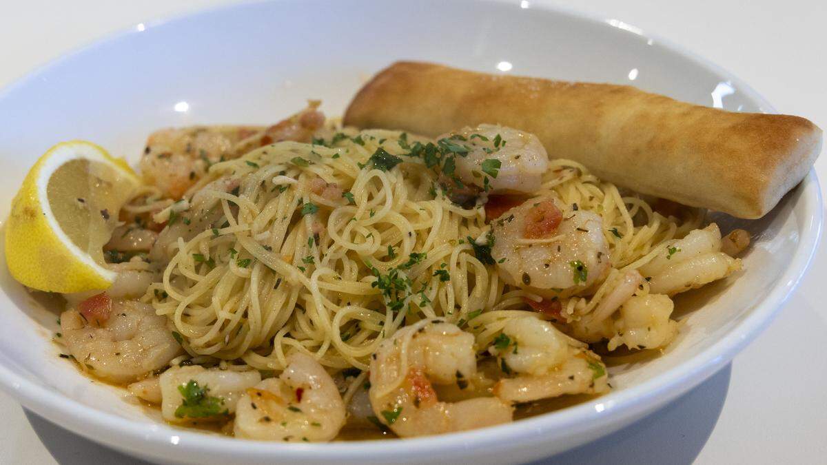 The Shrimp Scampi ($14.50) dish at Nothing But Noodles has shrimp and angel hair pasta sautéed in a tomato, garlic, and lemon scampi sauce. 