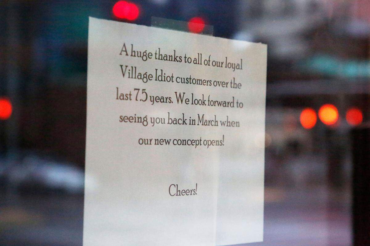 A sign was posted on the door of The Village Idiot restaurant in downtown Lexington saying it had closed.