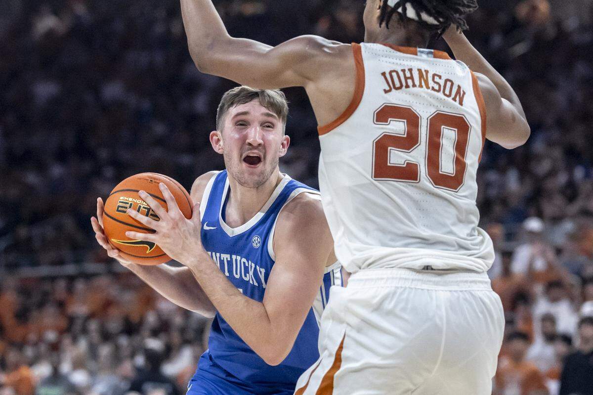 Kentucky forward Andrew Carr has struggled while trying to play through a back injury. He fouled out of the game against Texas on Saturday night.