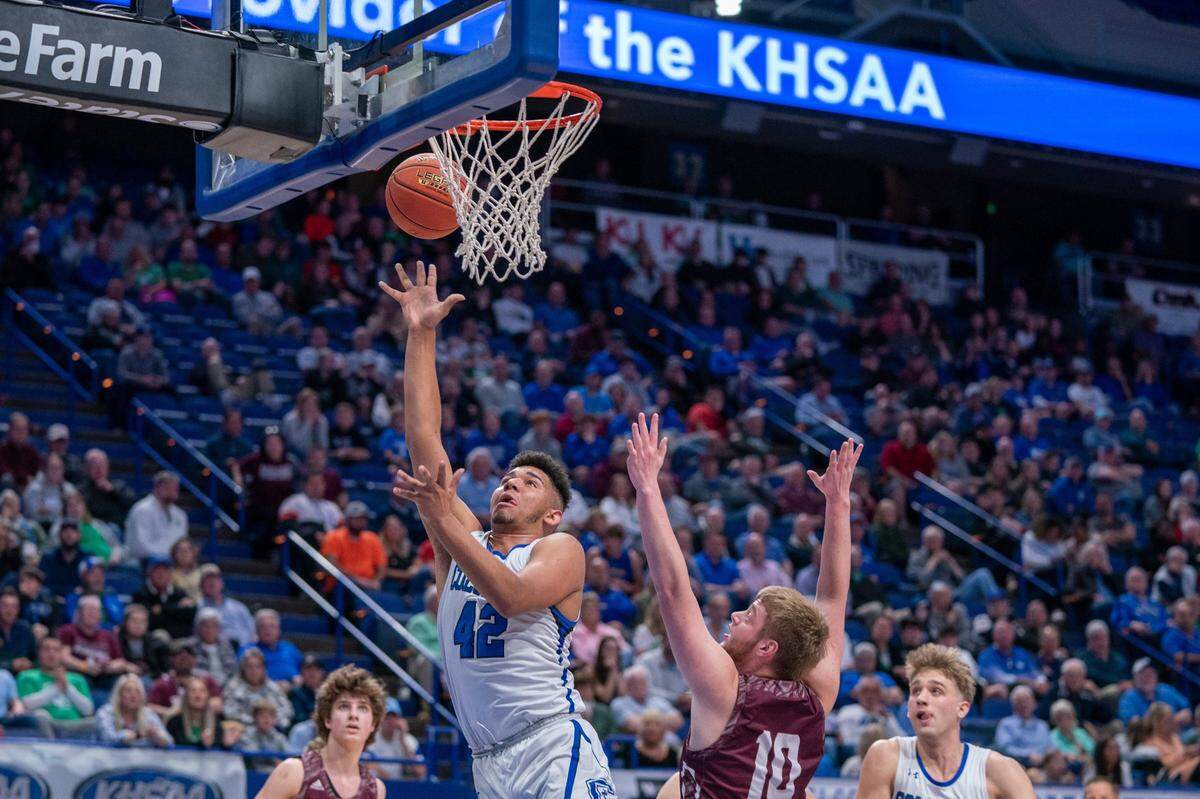 Chandler Starks (42) scored 21 points and had 12 rebounds for Covington Catholic on Thursday.