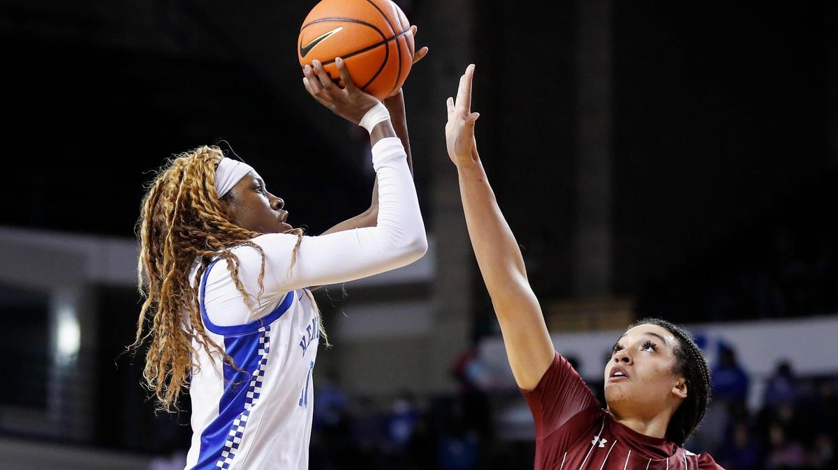 Kentucky’s Rhyne Howard, left, takes a shot over South Carolina’s Brea Beal at Memorial Coliseum on Feb. 10. Howard averages 20.4 points per game for the Cats.