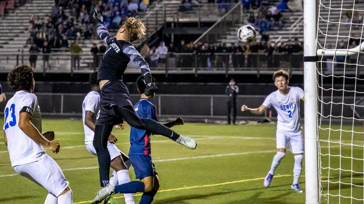 Henry Clay's Connor Taylor (2), right, prepares to head-in his game-winning goal after the ball got past Lafayette goalie Aiden Stark (0) during the 11th Region semifinals, Wednesday, Oct. 15, 2025 at Paul Laurence Dunbar High School in Lexington, Ky.