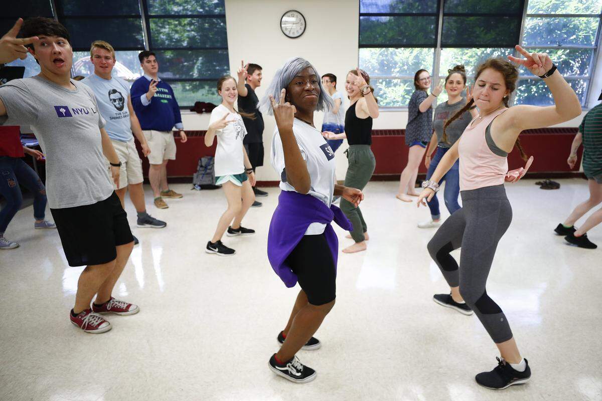 Christelle Mutombo, of Louisville, center, instructs her afrobeats dance class during the Governor’s School for the Arts at the University of Kentucky College of Fine Arts in Lexington, Friday, June 28, 2019. Students were participating in “smorgs” on Friday which gives them a class outside of their artistic discipline.
